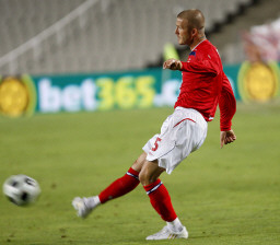 David Beckham, a former Milan player, - The AC Milan Fan