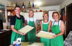 Happy group over their freshly made potato gnocchi