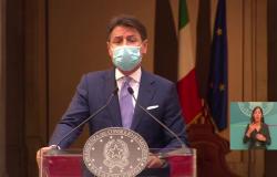 Italy's premier Giuseppe Conte wearing face mask during press conference