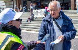 A steward checks QR codes in Venice