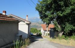 Panoramic spot to build a 100sqm villa with 3000sqm of olive grove, views of the mountains and a distant lake.  1