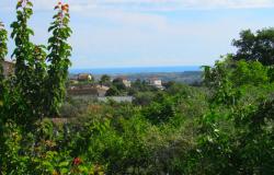 Finished semi-detached town house with 2000sqm of olive grove and 90sqm out building with sea view, located 15 minutes drive to the beach 11