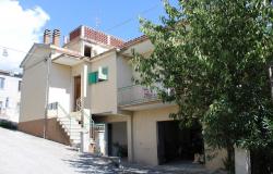 Detached, country, stone cottage in a panoramic position with barn, olive grove, garage, cellars and recently renovated  0