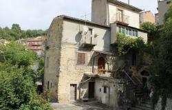 200 year old block with 2 apartments, drive and garden in the village center and open mountain views 0