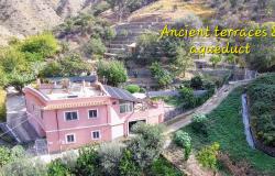 Ancient Aqueduct and Terraced Land