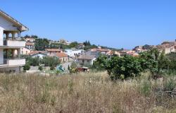 900sqm building plot, flat land, for a Villa of 200sqm with some fruit trees, sea and village views, 200 meters from the center, 8km to the beach  0