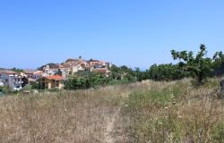 900sqm building plot, flat land, for a Villa of 200sqm with some fruit trees, sea and village views, 200 meters from the center, 8km to the beach  4