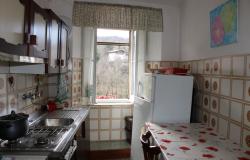 1950s 3 bedroom apartment, habitable, in a lively mountain town in front of a fast flowing river  3