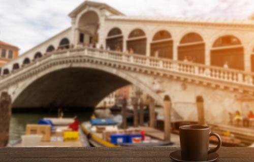 hot drink in front of bridge in Venice