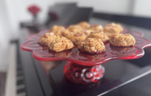 baci di assisi on a red tray