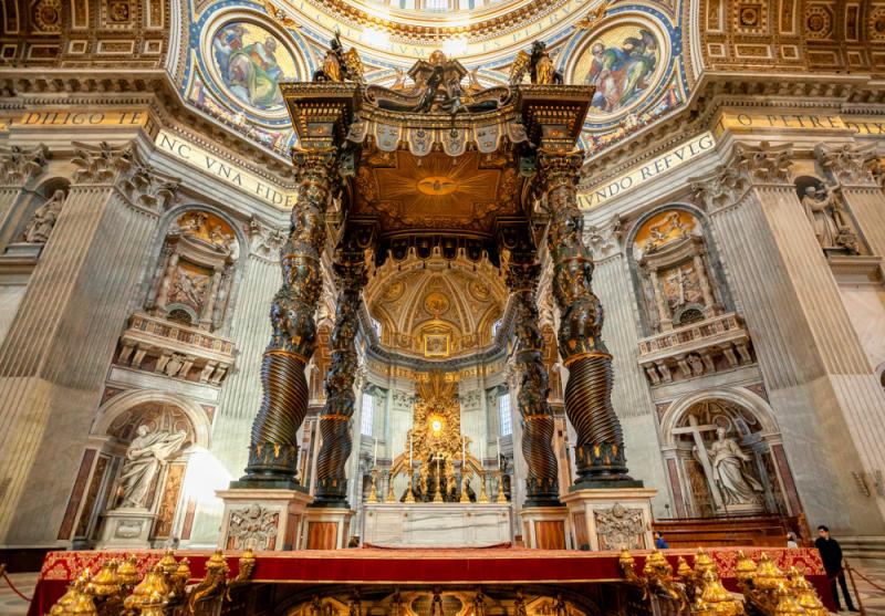 Gian Lorenzo Bernini's Baldacchino (canopy) towers over the tomb of St. Peter