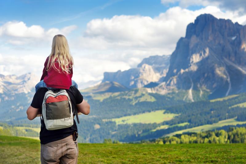 Father and daughter in Italian Alps