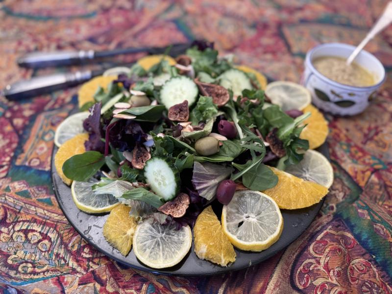 Salad with citrus, almond and caper dressing